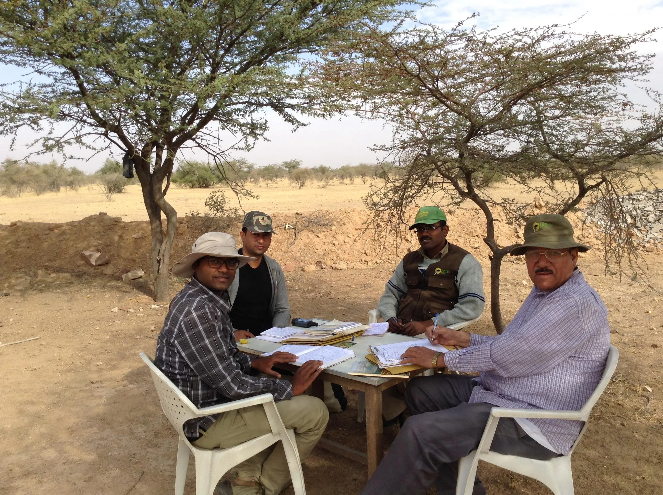 Dr. Patil (first from left) in the field with his colleagues