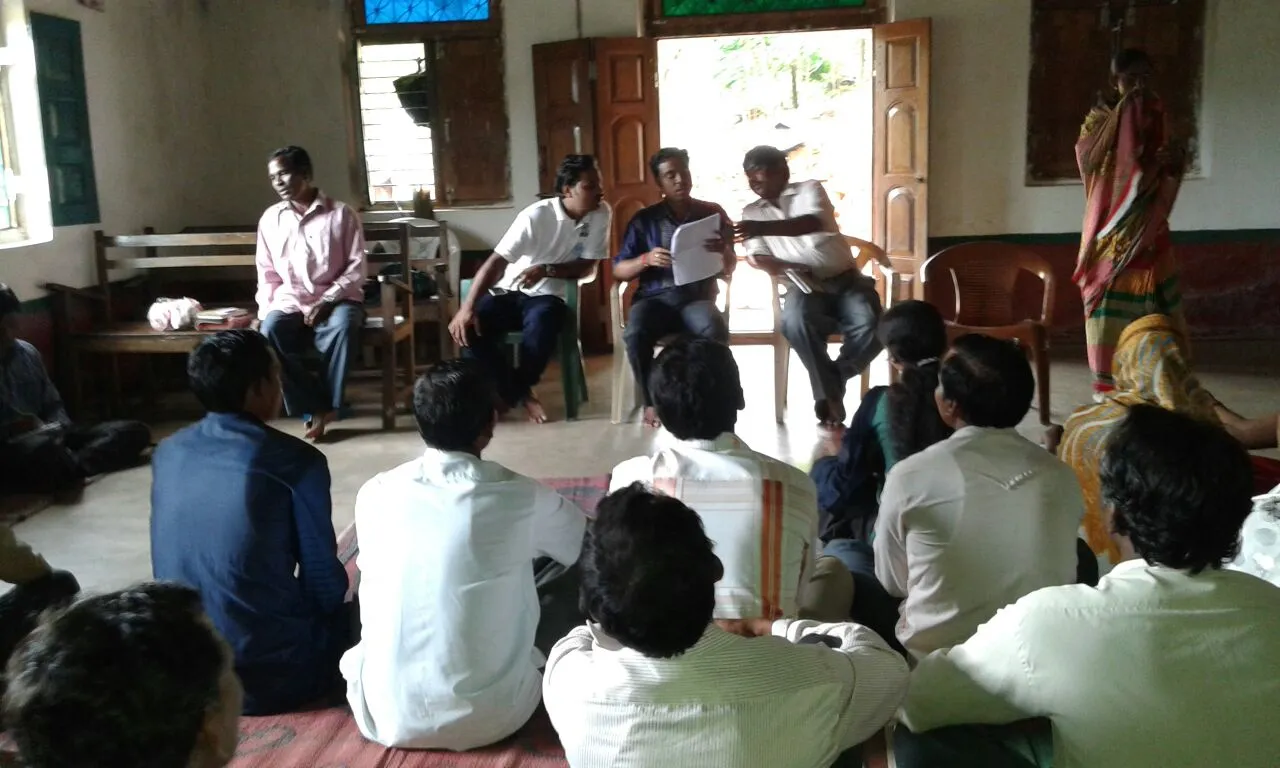 A meeting inside a church of Muri village of Luhangara panchayat, discussing how to include the left out beneficiaries in the campaign 