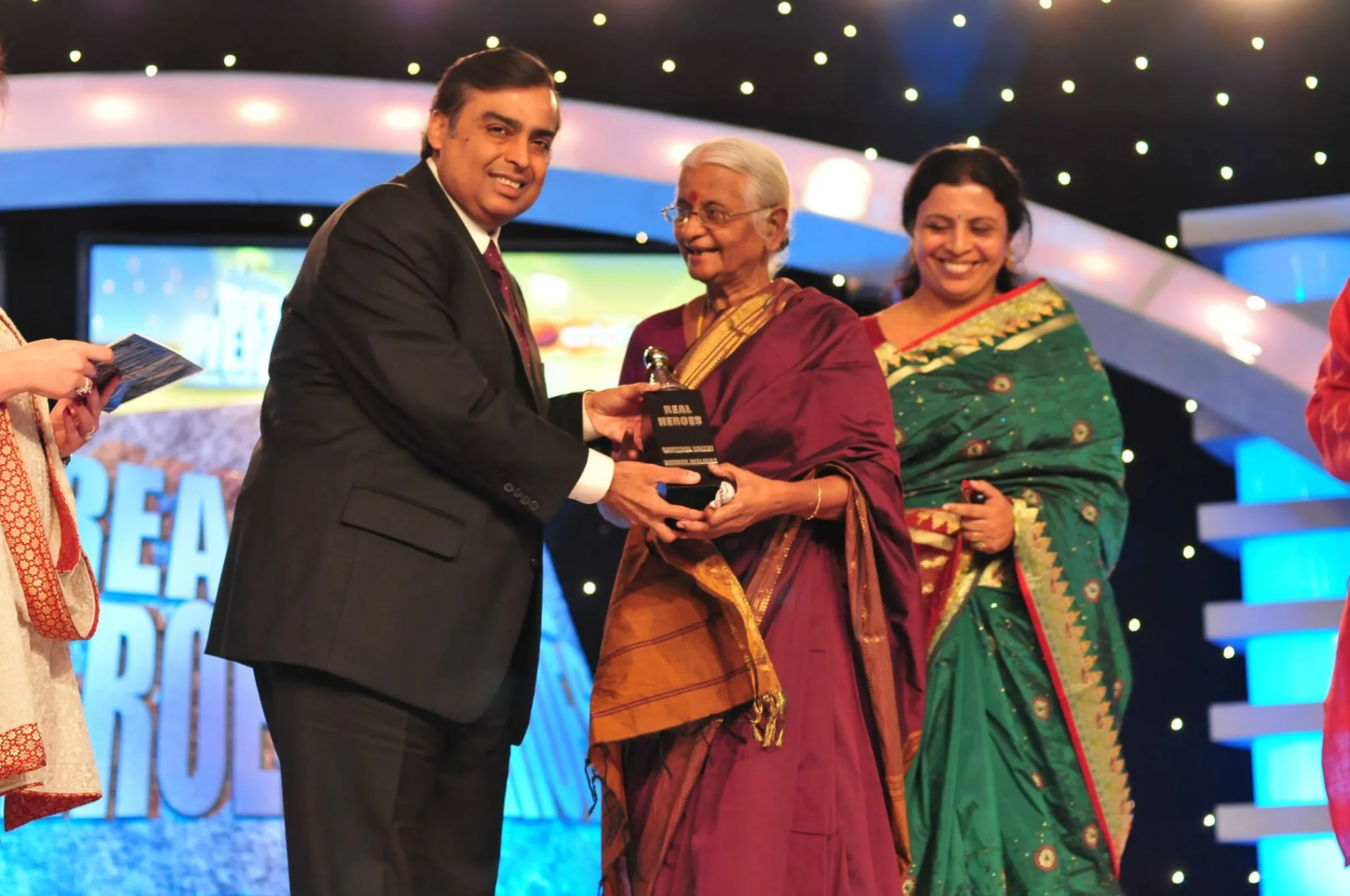 Savithri (center) along with Srilekha (right) at the CNN IBN awards.