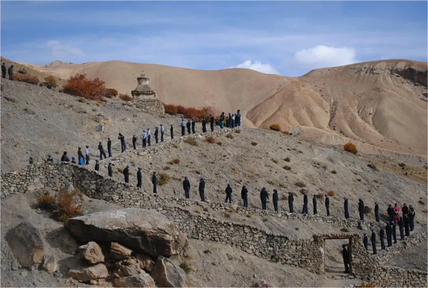 Residential School Lingshed - A 100 school children wait patiently for 4 hours for the 17000 ft team to reach. They were carrying books, games and furniture for the school.