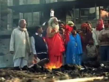 Vikas performs last rites of the unclaimed dead bodies found in the river.