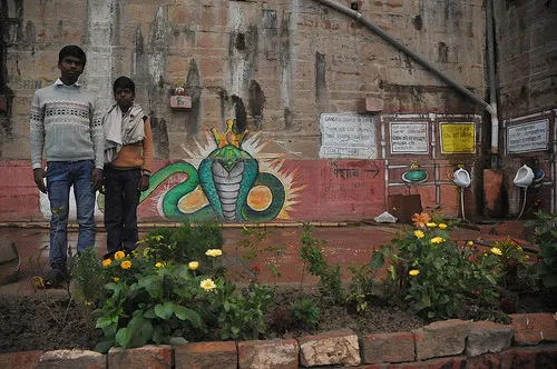 Deepak and Amit proudly posing at their outpost, Rana Pratap Ghat, Varanasi. You can see the toilet corner!