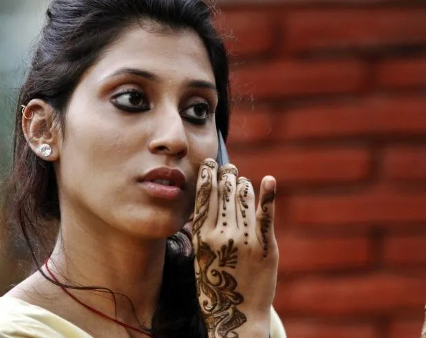  marked by the tying of a Rakhi, or holy thread by the sister on the wrist of her brother. (AP Photo/Rajesh Kumar Singh)