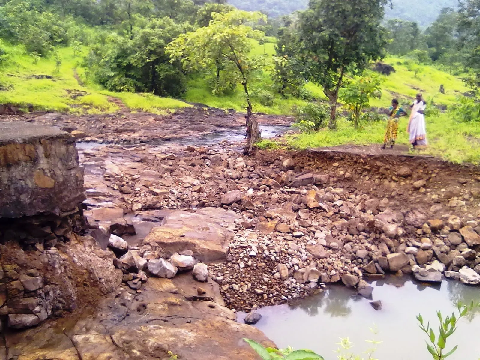 This is the broken pathway that the women of Pada Shendyachi Meth have to cross to access a small well that meets their water needs.