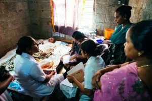 The Pallium India team on a home visit