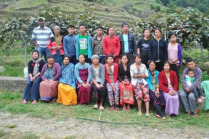 Puneet with a group of farmers in Dirang, Arunachal Pradesh after a week of kiwi fruit harvesting and packing. Image courtesy: Crop-Connect