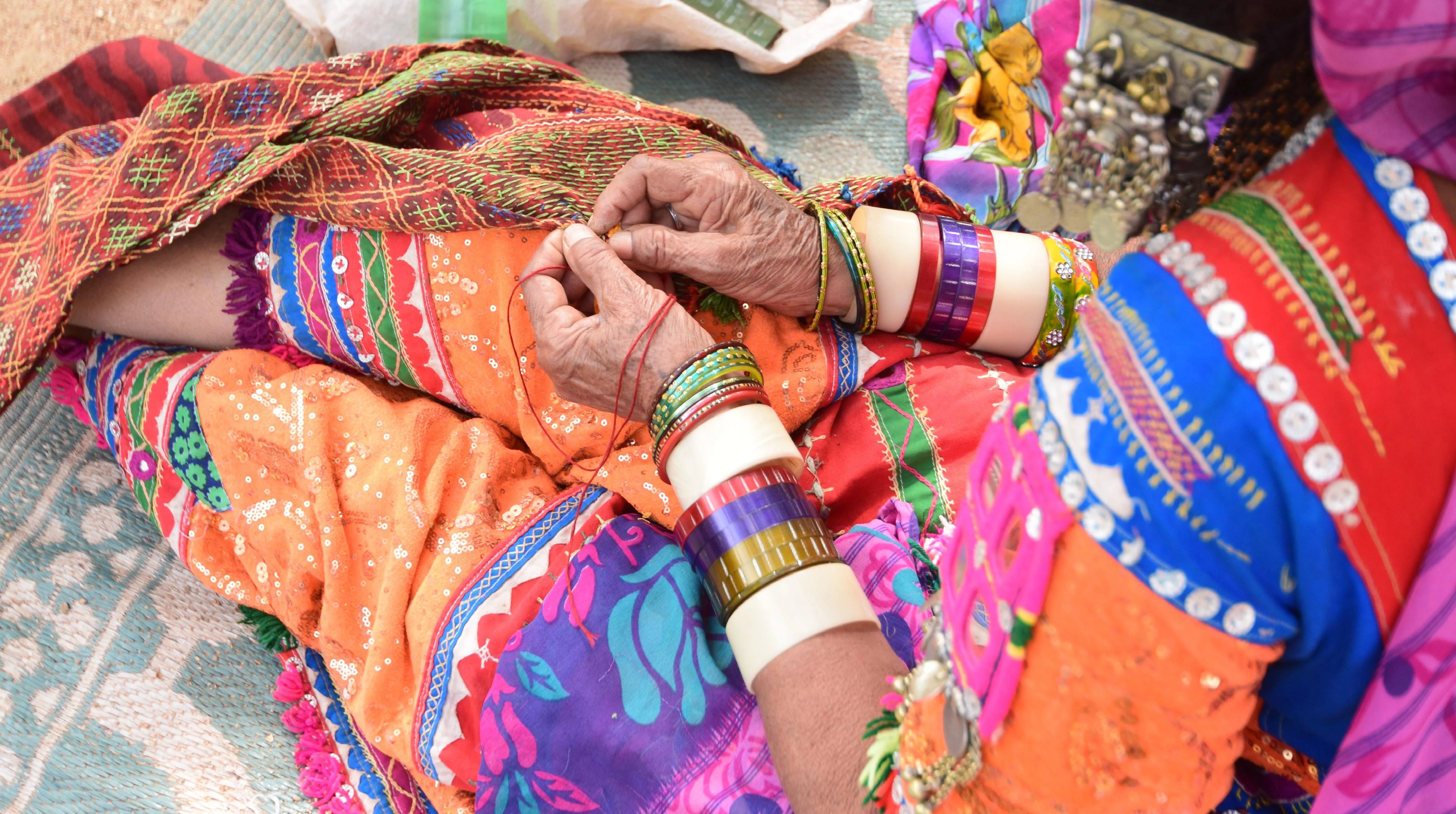 Artisans busy at thier Lambani Art work