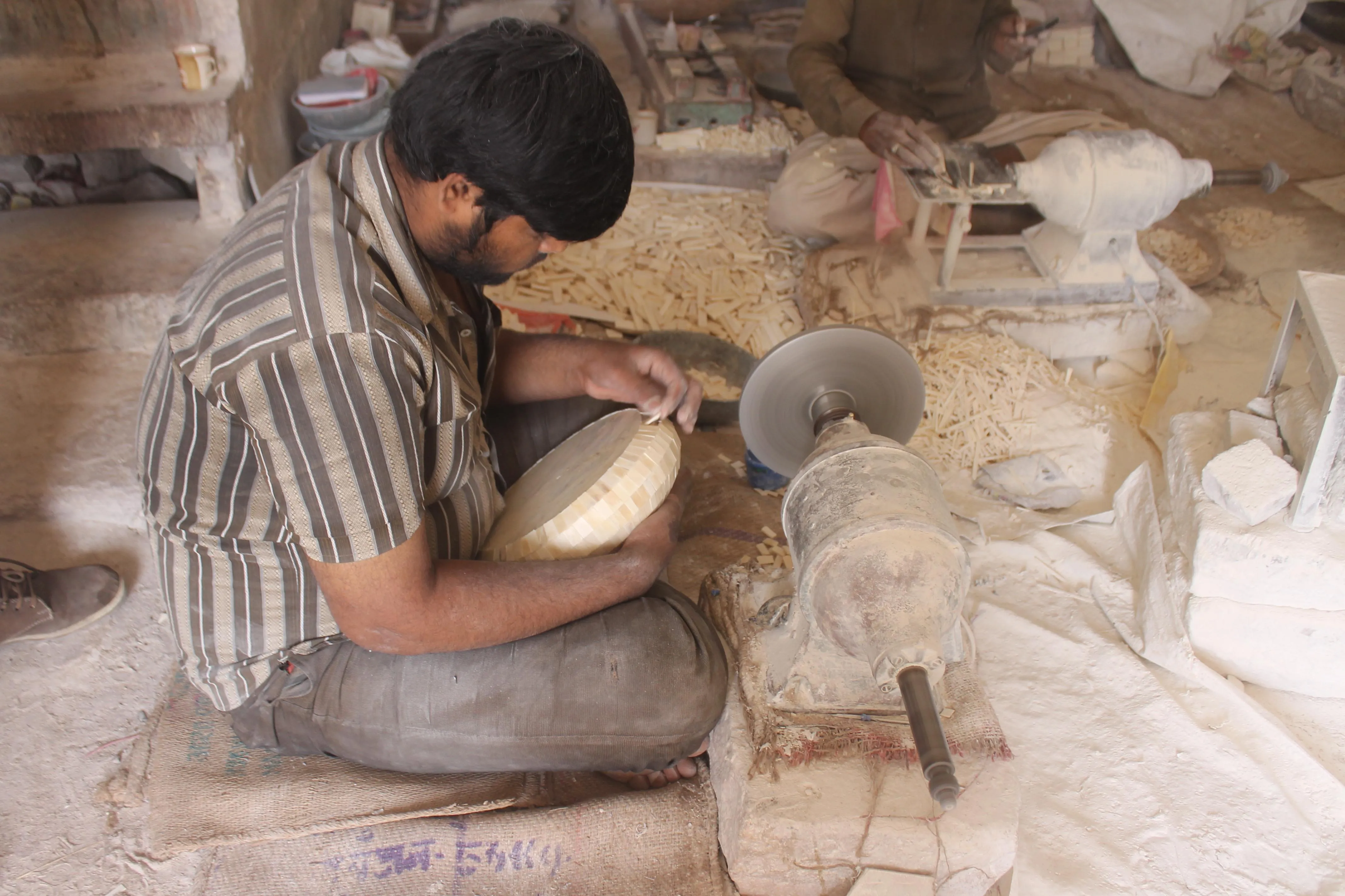 Camel Bone Artist at work