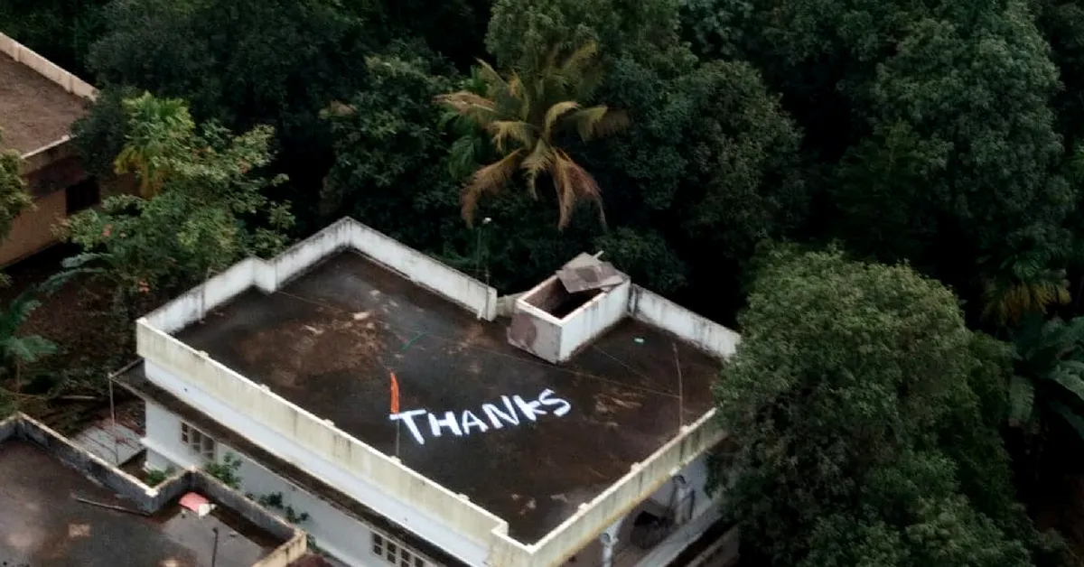 Saved thanks to Naval Commander Vijay Varma, the woman left a 'Thank You' note on her terrace in Kerala. Image Credit: <a target=