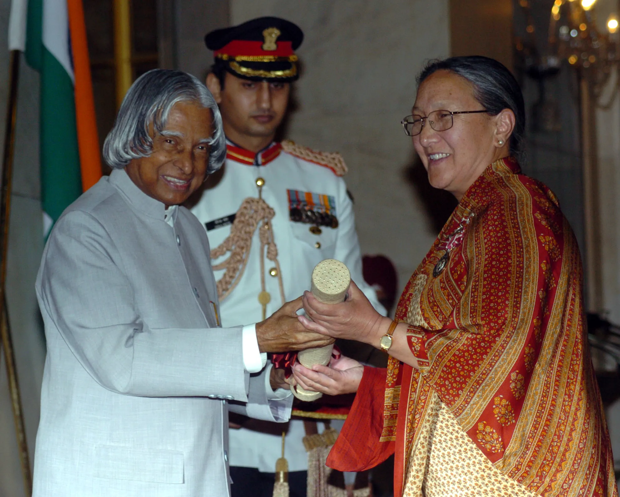Former President, Dr. A.P.J. Abdul Kalam presenting Padma Shri to Dr. Tsering Landol, a Gynaecologist & Obstetrician of Leh Ladakh, at an Investiture Ceremony at Rashtrapati Bhavan in New Delhi on March 29, 2006. (Source: Wikimedia Commons)
