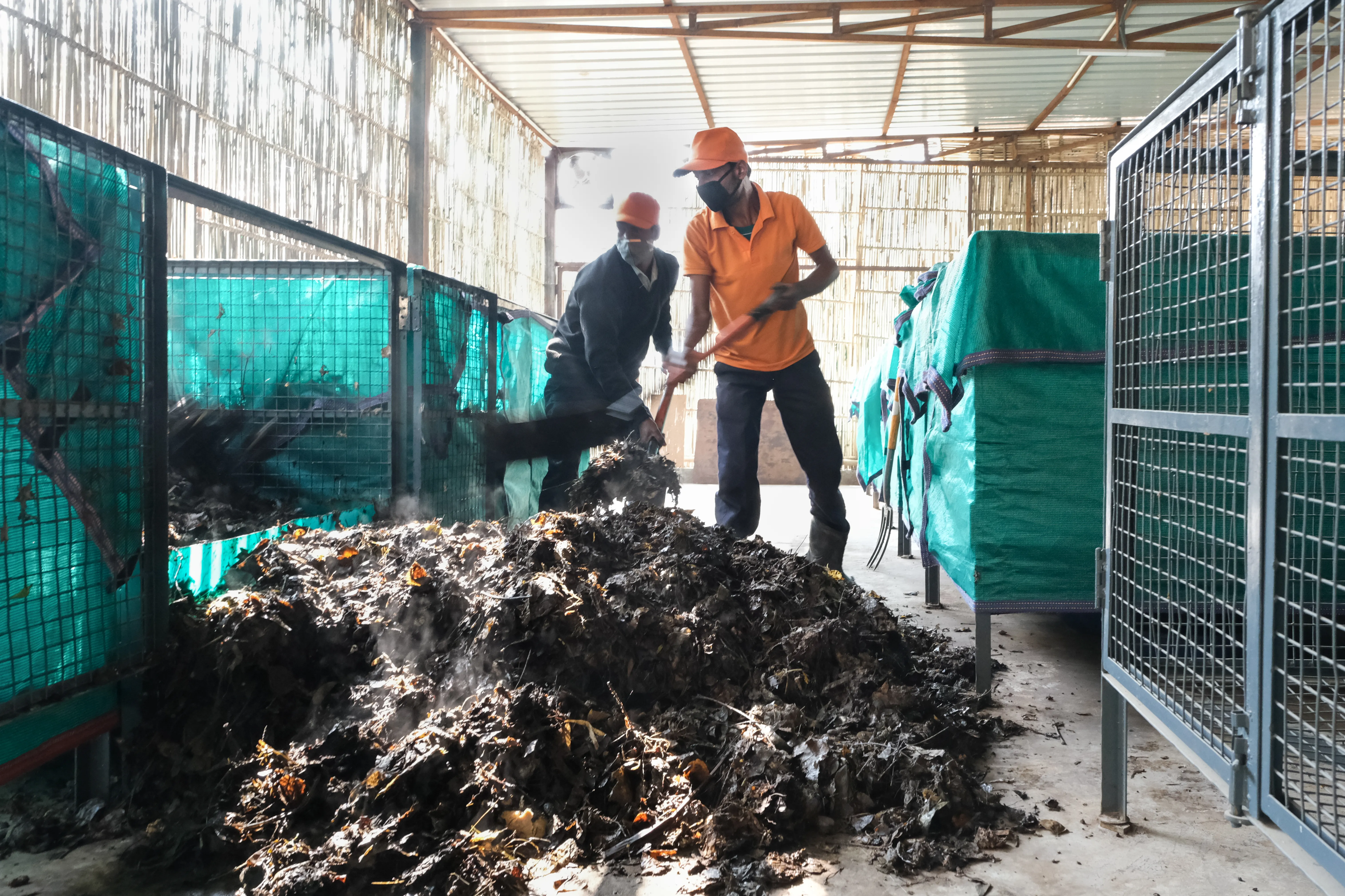 Churning compost at the “on-site