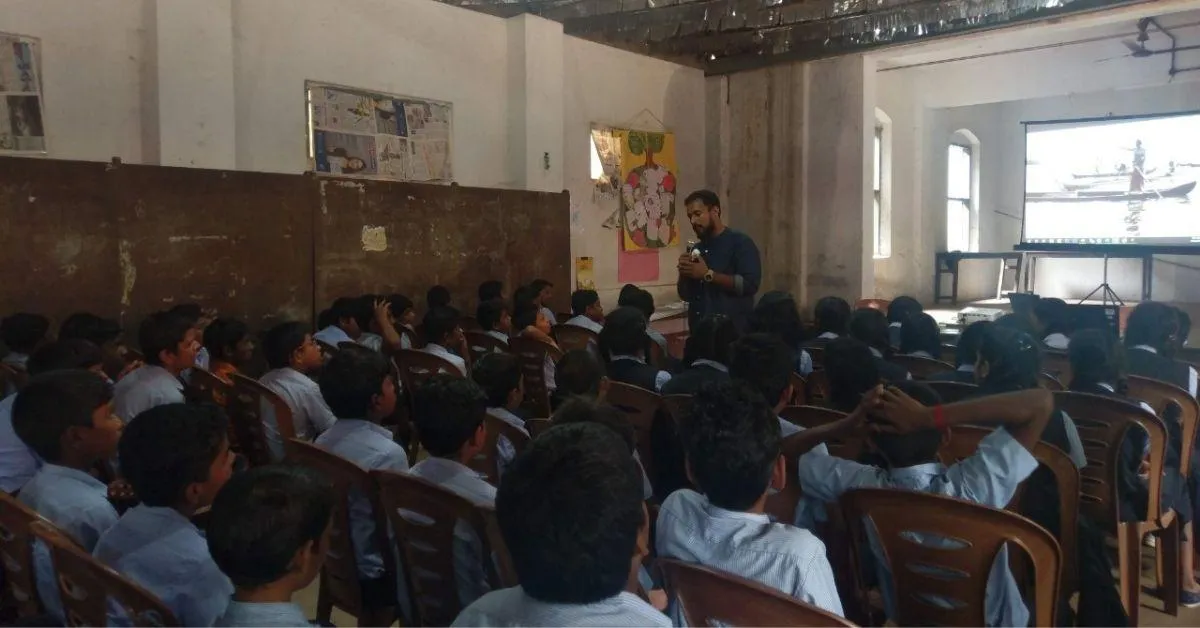 Kerala climate activist with students at Muhamma village 
