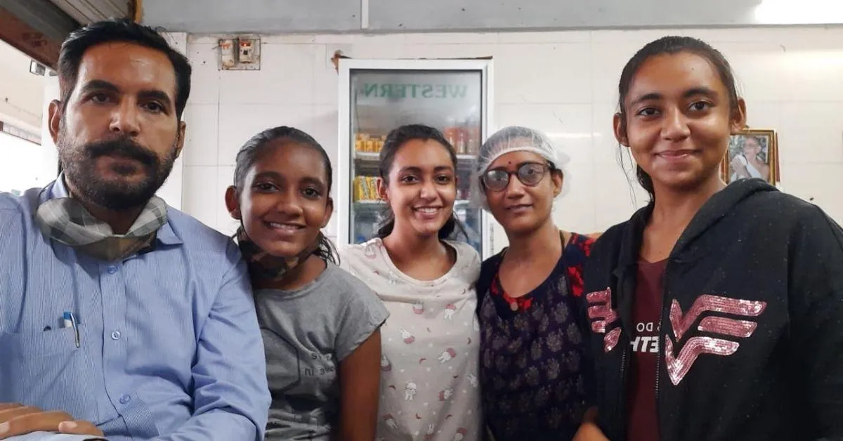 Induben with her family
