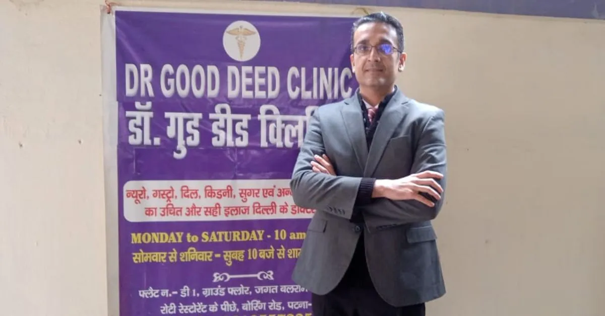 delhi neurologist dr chandril chugh stands in front of a blue banner that reads dr good deed clinic