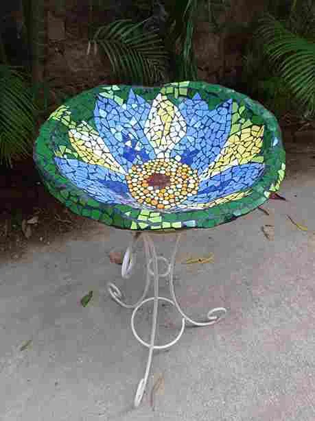 A mosaic bird bath.
