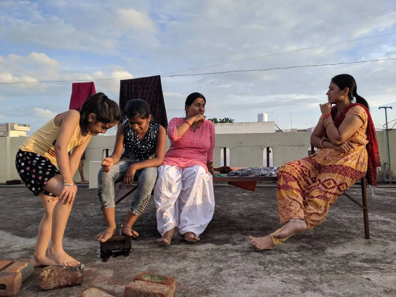 Sushma & Asha enjoying their everyday evening chat before they leave for dinner preparations.<br />
