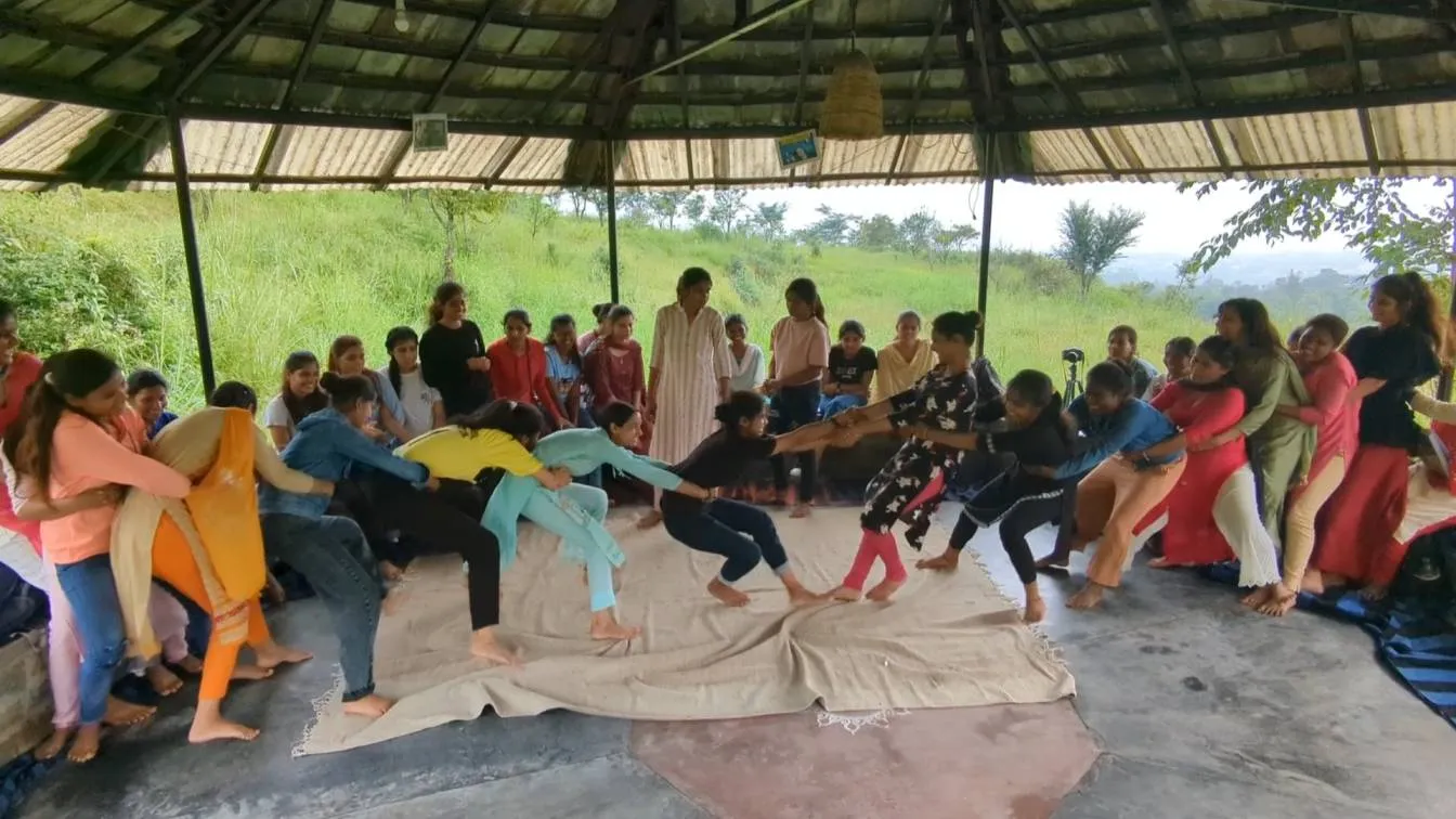 - Young rural women from Sajhe Sapne enjoying a game before their learning sessions begin.<br />
