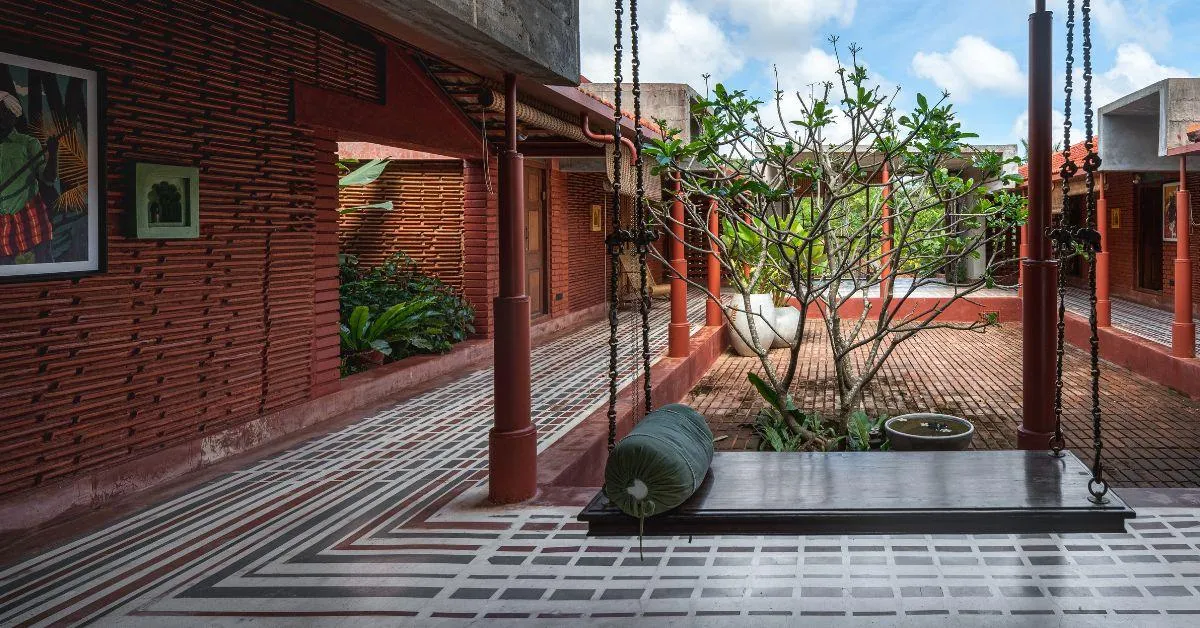 Brick laid courts and oxide flooring contributes to the aesthetic of the home