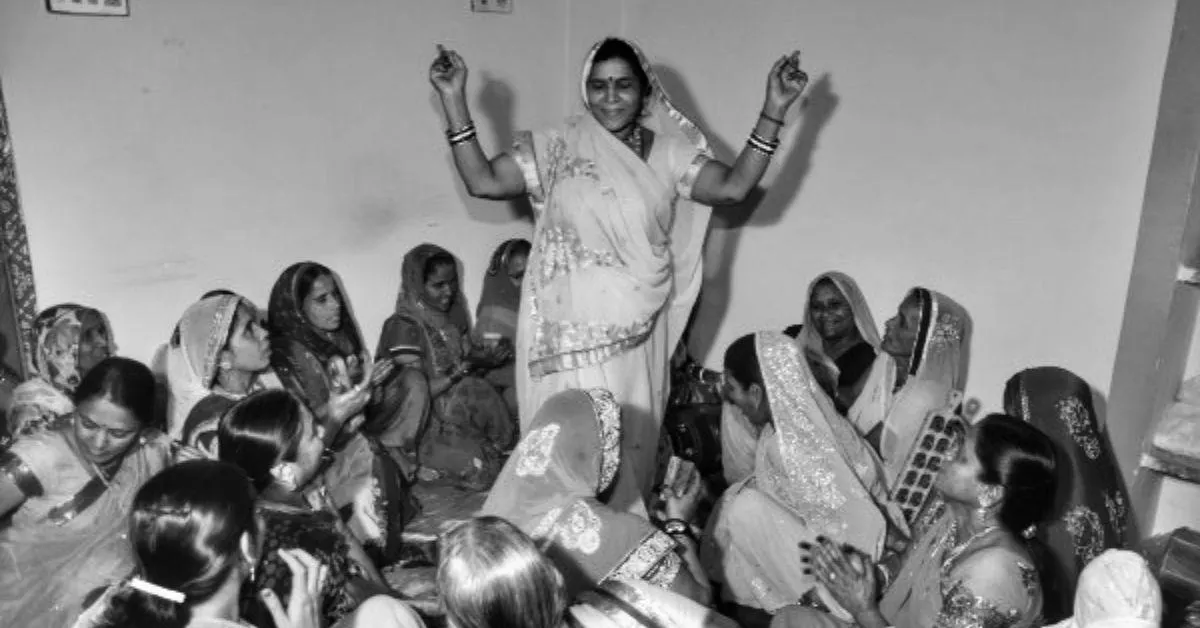 Women from a neighbourhood in Khargone, Madhya Pradesh after finishing all the chores singing and dancing together. 