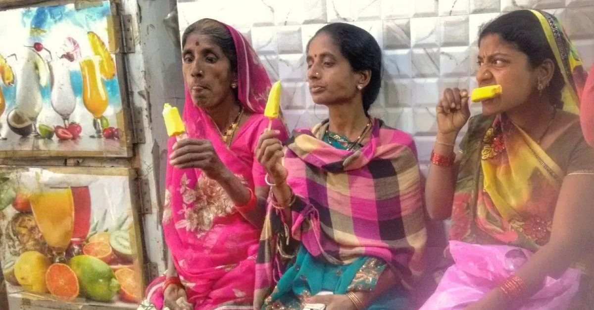  Women in Khargone (M.P) enjoying an ice cream break on a hot summer afternoon.</p>
<p>