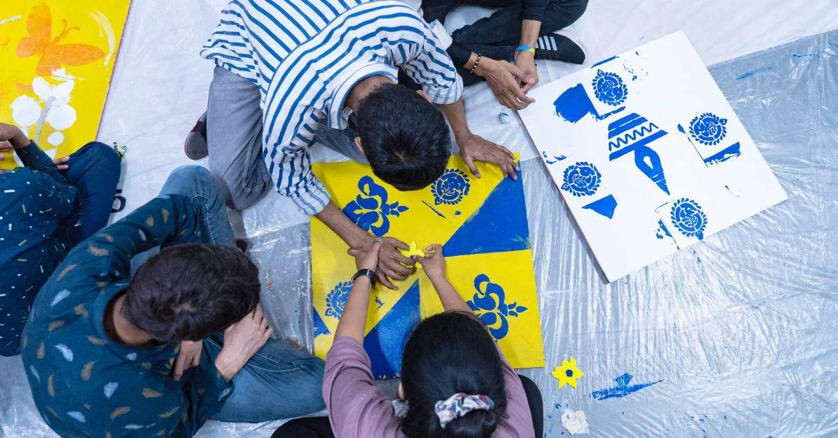 The students are encouraged to draw and paint designs that reflect the Rajasthani culture