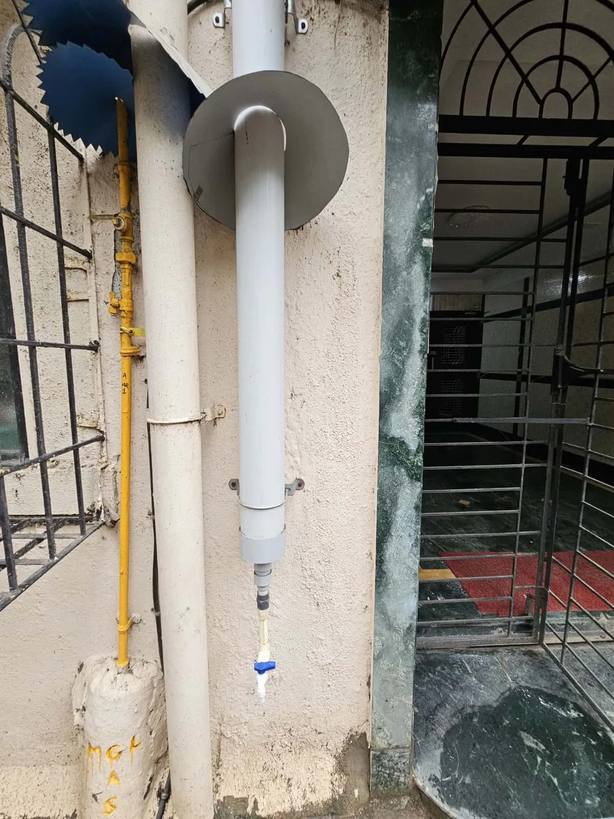 This pipe collects AC condensate water