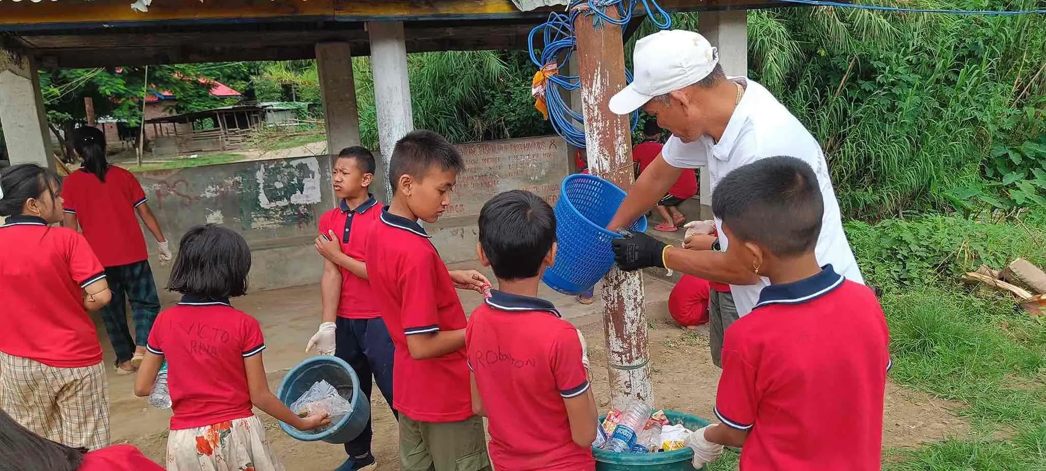 Khagembam Indrakumar Singh and his students participate in a cleanup drive. 