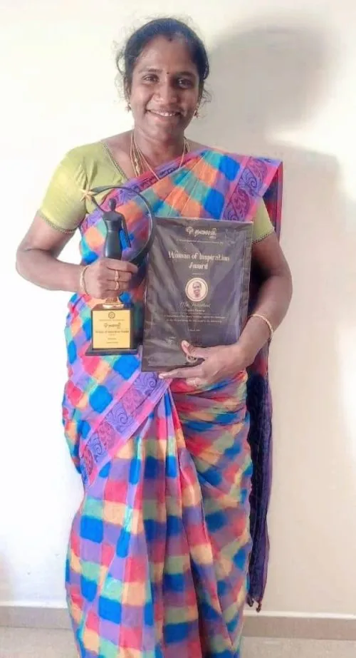 Ponnarasi with her awards.