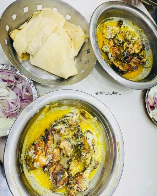 Smoky grilled chicken drenched in buttery gravy, served with rumali roti