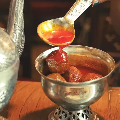 Rista—succulent Kashmiri lamb meatballs drenched in a fiery, aromatic saffron-infused gravy. Image Source: Instagram