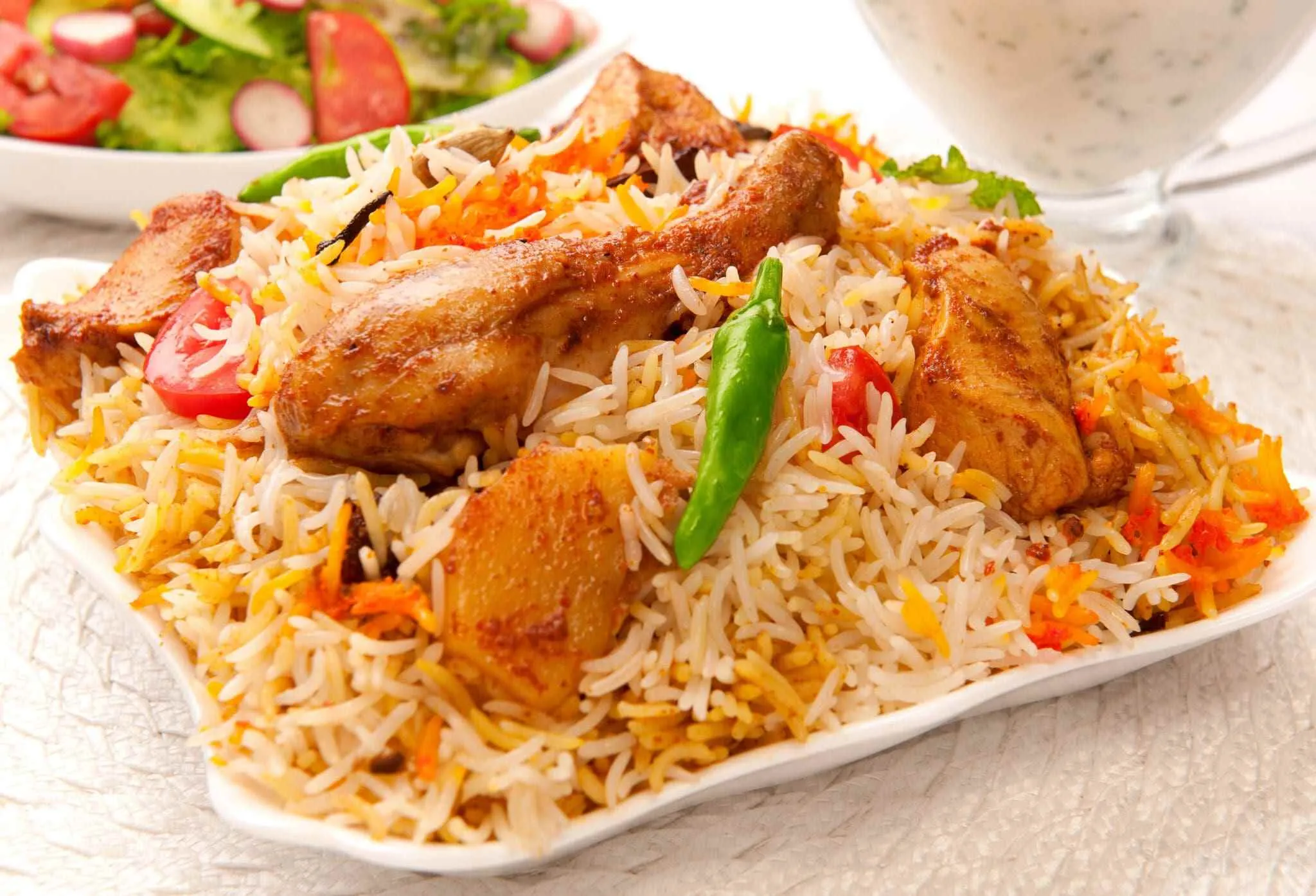 Flavourful Muradabadi chicken biryani with aromatic spices, tender meat, and basmati rice. Best served hot! 
