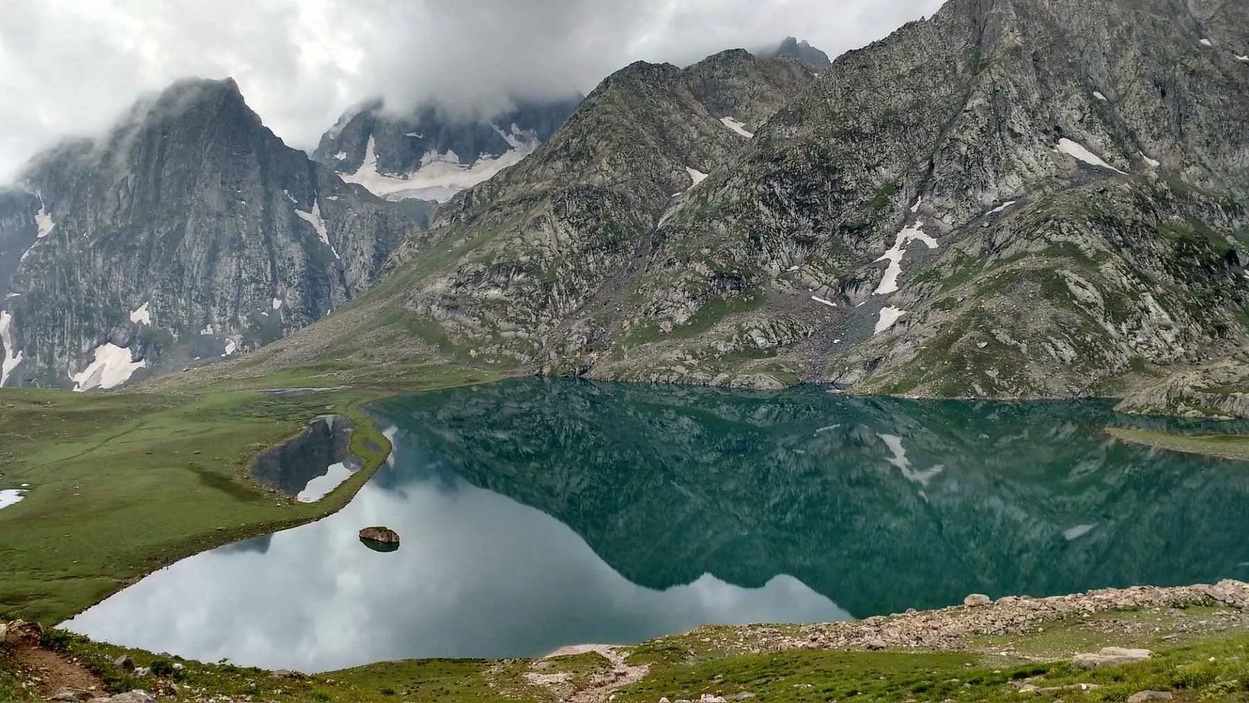 Krishansar Lake is a hidden sapphire, cradled high in the Kashmir Himalayas. 