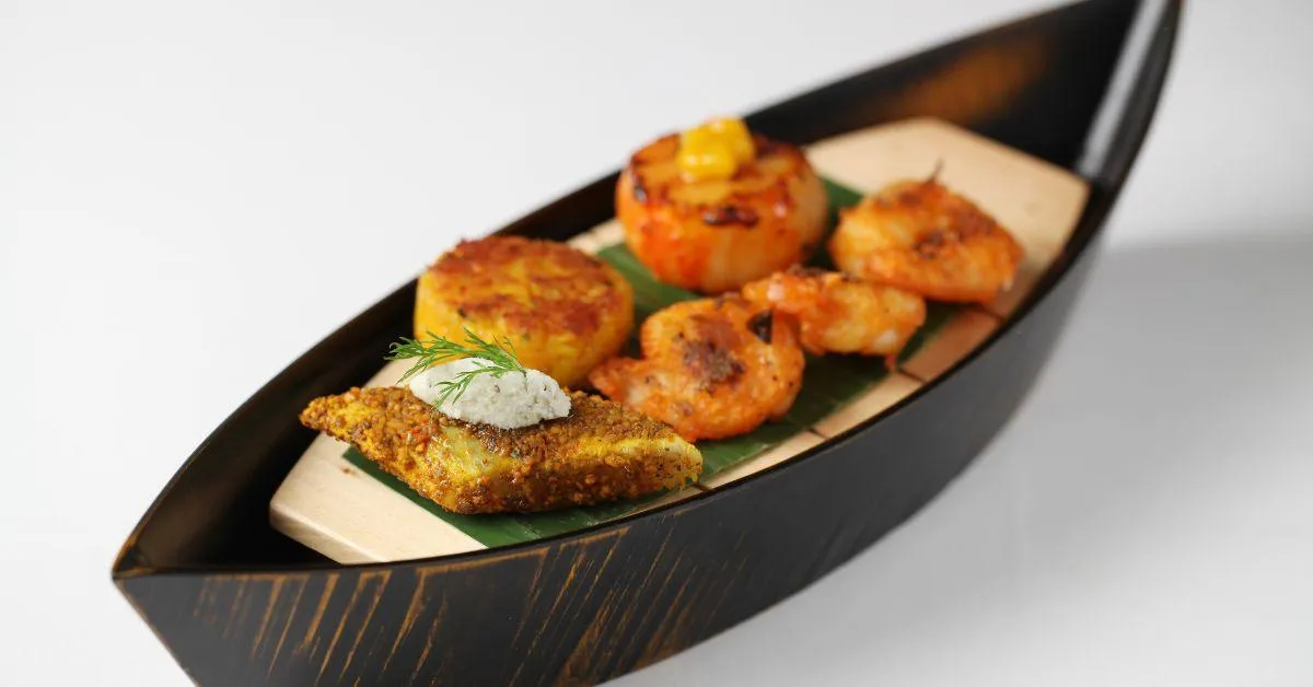 The Fisherman's Catch dish features a selection of seafood cooked in South Indian flavours 