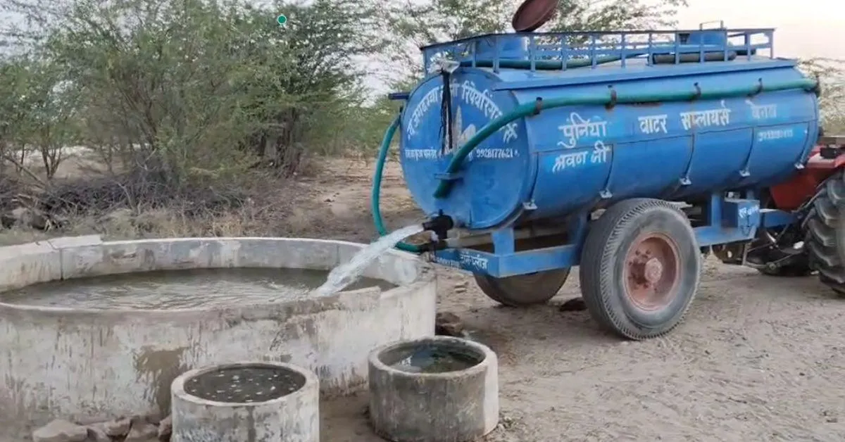 water tanker filling the pond