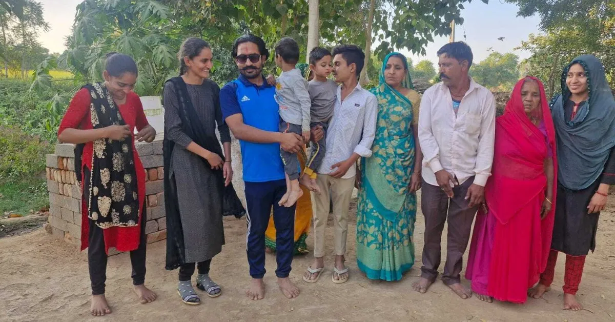Vishnu Vaghela with his family members in their village.</p>
<p>