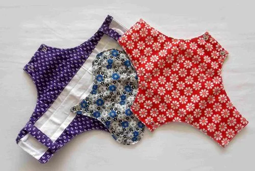 These Uger pads, made entirely from cotton, were designed by Lakshmi to be biodegradable within months, stitched by rural SHGs and intentionally kept free of copyright.