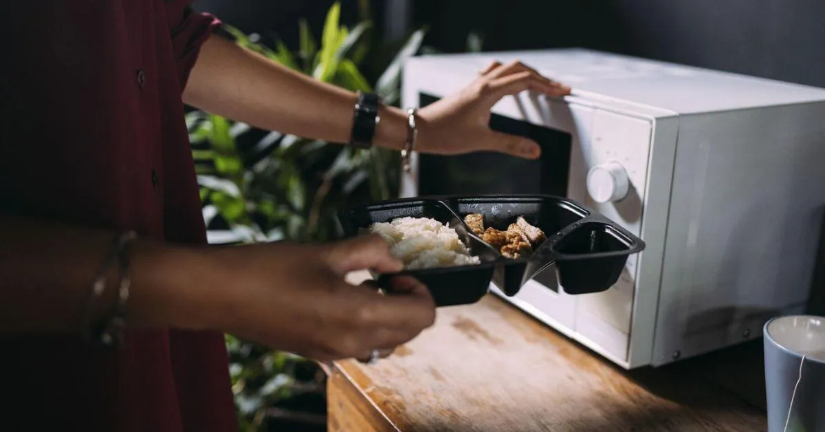 black plastic container into microwave