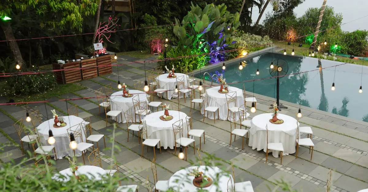 The couple used wooden chairs and tables that were provided by the venue for the guests