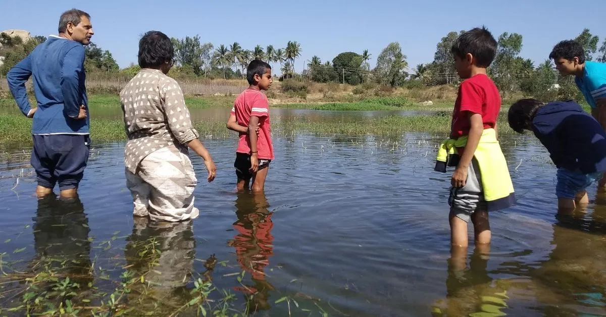 Rachit’s children are raised on a self-sustained orchard, learning Sanskrit and science not from books, but through life.