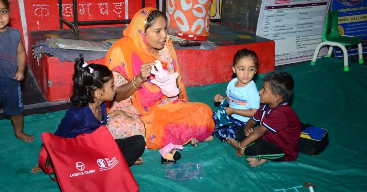 In Kukda, mentor mother Abhilasha arrives with kits to make learning fun for preschoolers.