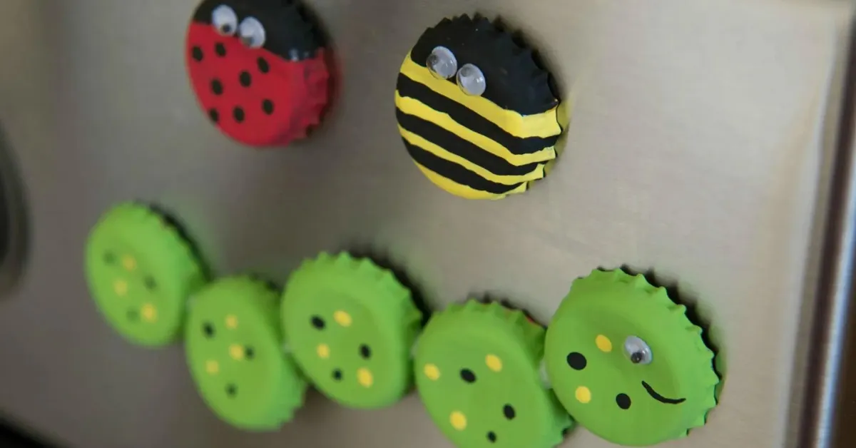 Choose small images or drawings and cut them to fit inside the bottle caps; Picture source: SheKnows