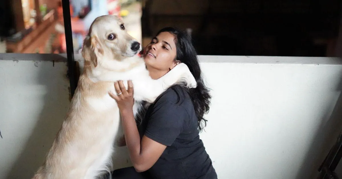 Safura with her pet dog in her Bengaluru home. 