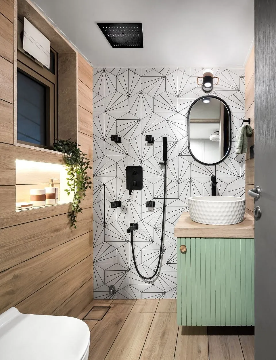 The Studio by Mindspace InteriorsThe site is a compact one-room with an attached mini kitchenette and bathroom. The rectangular plan of the house is about 10ft in width and slightly more than 21ft in length, covered by a traditional terracotta roof with a framework of old Burma teak. A loft space right above the kitchen was also part of the plan. 
