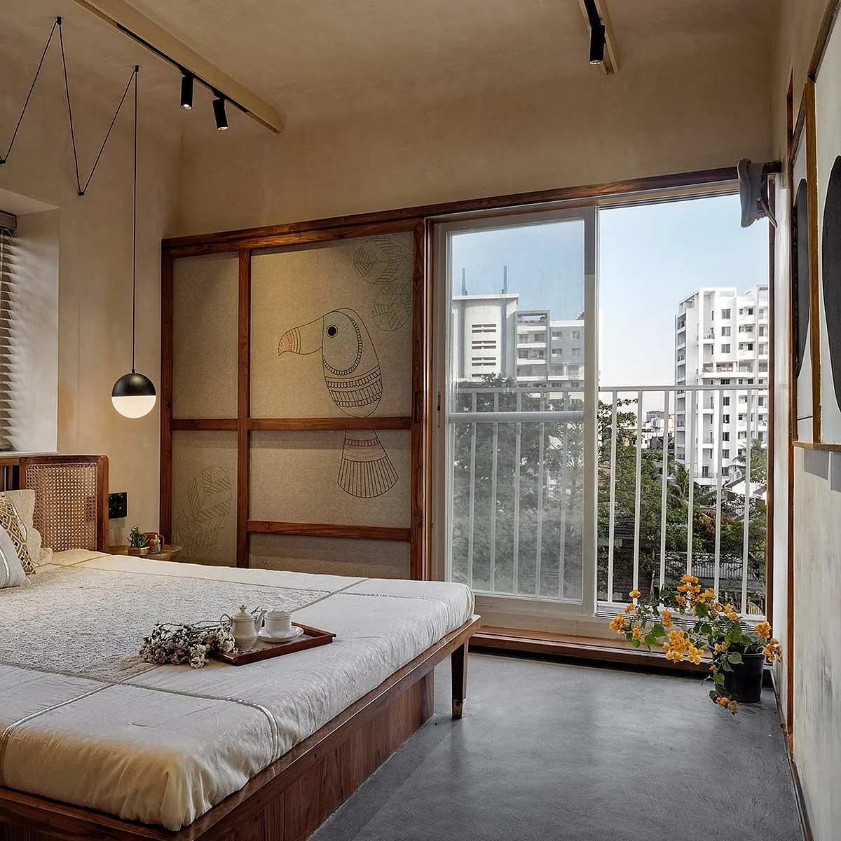 Folk House by Mind Manifestation Design LLPFolk House is a low-key home designed by Mind Manifestation Design LLP for a young couple with diverse professions — a policeman and a doctor — in Pune. The couple, both nature lovers, share a fascination for local Indian arts and wanted a down-to-earth home designed with natural materials. They also insisted on toned-down elements in this 800-square-foot apartment. Maximising the use of this compact space to cater to multiple functions during different hours of the day is again a response to the client's brief. 