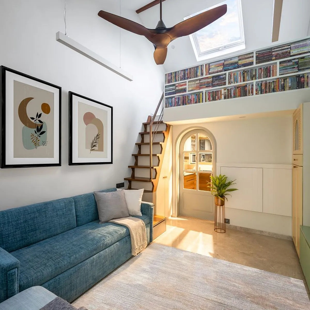 The Studio by Mindspace InteriorsMindspace Interiors was commissioned by Dharmendra Joshi, an educator, to design his 200-square-foot apartment in an old chawl at Malad, a suburb in Mumbai. An avid reader, the primary requirement in Joshi's brief was ample storage space for the countless books he has collected over the years. He was sure about living with modern amenities, was open to experimenting with new materials, and wanted subtle and soothing colours reflecting calmness and warmth in his home. 