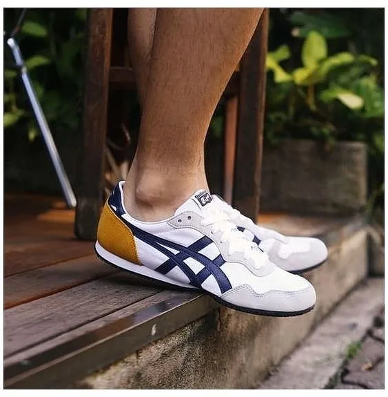 Down lowWhen it comes to classy, understated sneakers, Onitsuka Tiger’s Mexico 88 is probably up there with the best of them. Unlike hype-worthy kicks that have a short shelf life before the next big drop, this slender silhouette has proven to be ageless and timeless—a pair you can wear whenever, without thinking twice. But hold up. The shape of the shoe is such that it gives the illusion of elongated feet, which can make a short guy look disproportionate. The trick is to always opt for a pair with a more rounded toe and laces (don’t go commando) for a snug fit. And don’t ever pair them with jeans that go below your ankles. 