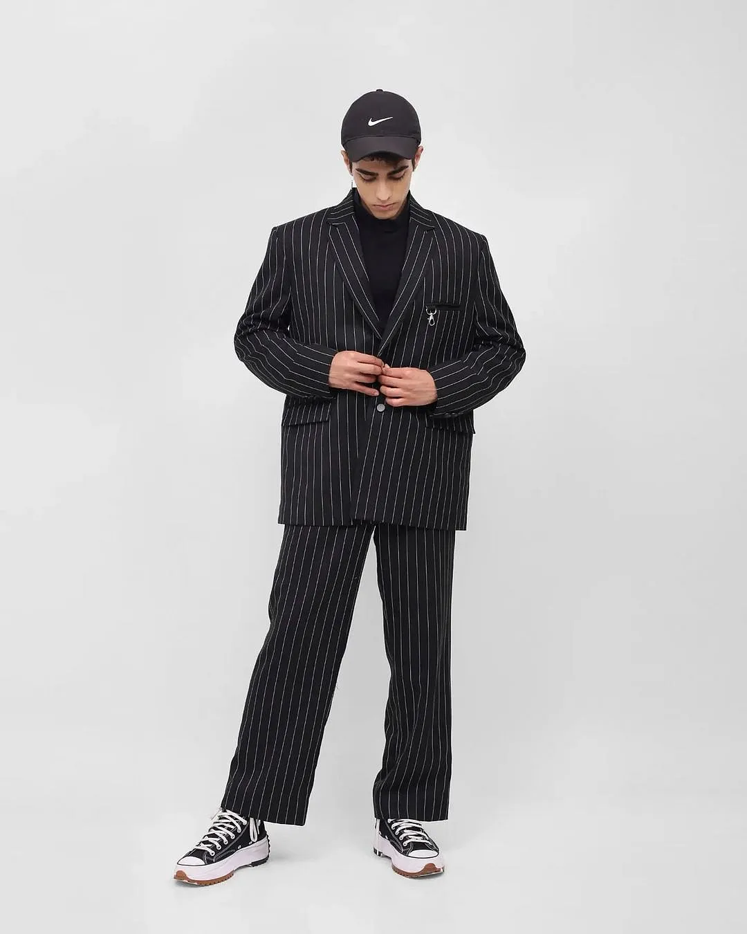 Op-HaneenScroll through the ‘About Me’ section of any designer or label and you’ll find the same words running across: classic, contemporary, minimal, maximal, disruptive, eccentric. Op-Haneen has a couple of these but it's actually pretty accurate for what the Delhi-based brand offers: a mash-up of everything. You’ll get standard fits in neutral colours. Heavy-duty prints on shirts. Even a skinny pinstripe suit you’d imagine the current hottest rock band Maneskin would wear. Basically, an intelligent way for the brand to bring every kind of audience on board. A no-brainer label to check out if your personal style is diverse.Prices starting from: ₹3,400Available at: Op-Haneen 