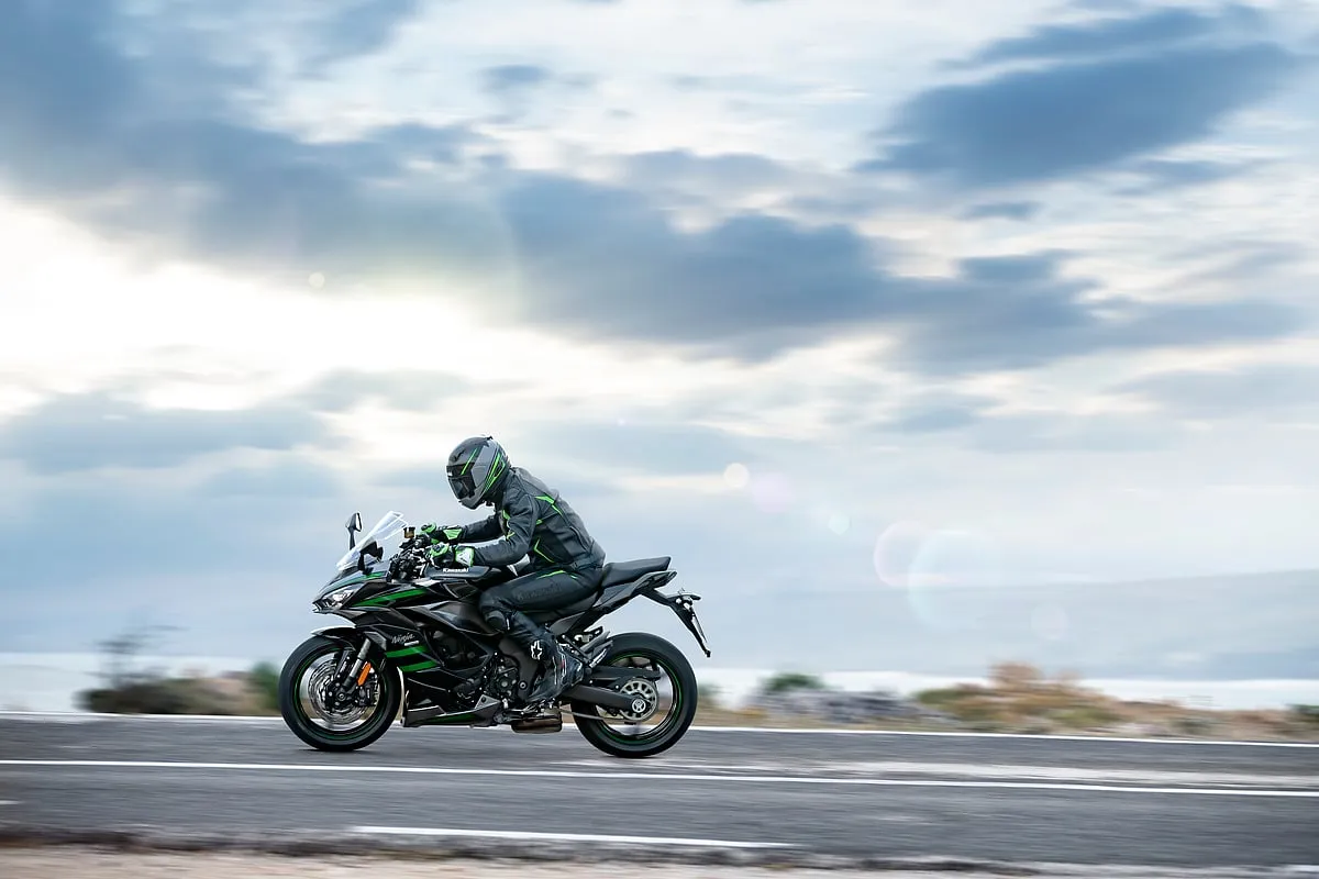 Kawasaki Ninja 1000SX This green machine is mean enough to pack a solid punch that will see all your sport-touring desires through for a princely sum of ₹11.51 lakh. It is powered by a 1043cc four-cylinder engine putting out 140HP and 111Nm of peak torque. Additionally, there is plenty of electronic trickery to get to grips with things, including Kawasaki’s cornering management system, ABS, cruise control and traction control. Aiding your cross-country effort are additional bits and bobs like USB and 12V power sockets for charging essential gadgets and bungee hooks for tying down luggage. Don’t like the idea of leaving your stuff exposed? Just spend a bit more for a set of lockable pannier boxes. It comes with Bluetooth connectivity and a 4.3-inch full-colour TFT, fully digital instrument panel to boot. 