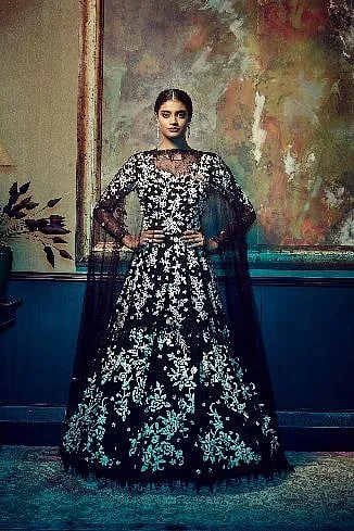 Re-working dupattas or adding updated blouse styles to a lehenga or a sari is now becoming the norm 