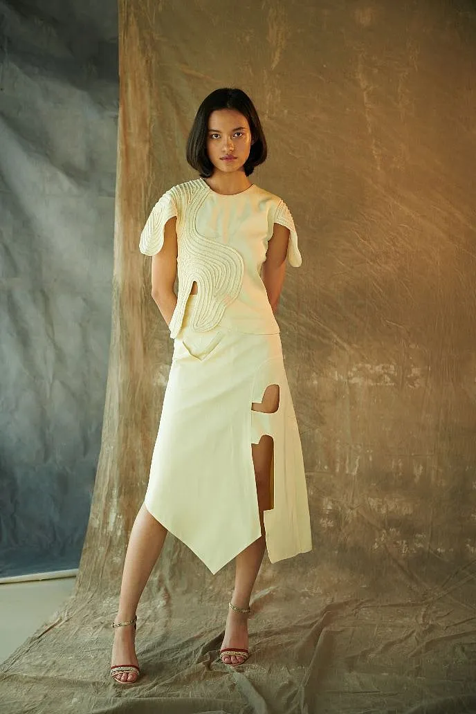 Mishé's collections are defined by detailed and deconstructed pieces crafted using eco-friendly fabrics 